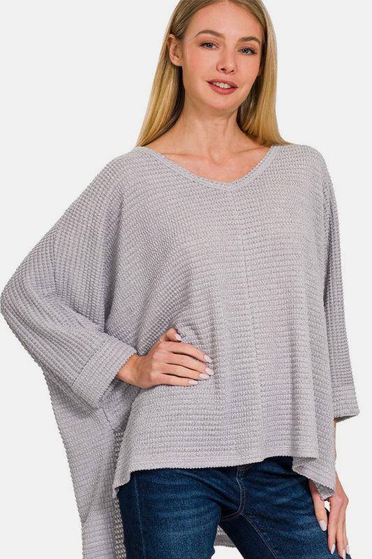 Blusa de manga larga con escote en V y abertura en punto gofre 