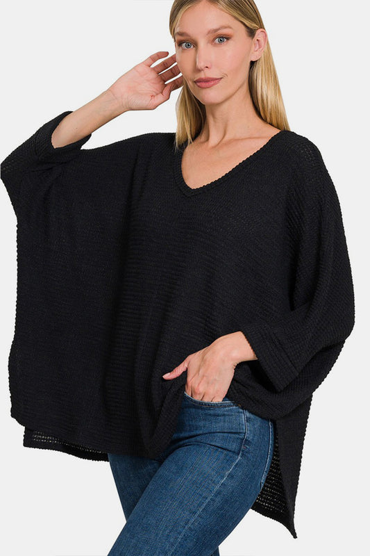 Blusa de manga larga con escote en V y abertura en punto gofre